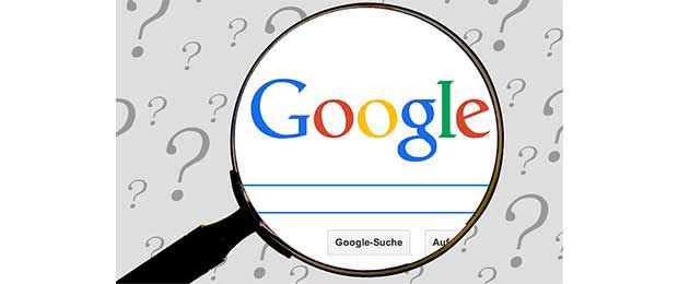 magnifying glass with Google